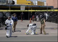 Peritos en la escena de crimen